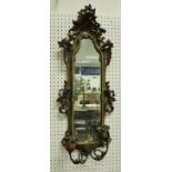 An early 19th century painted giltwood and gesso girandole pier glass with flower head sconces