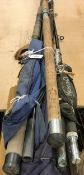 A collection of five sea fishing rods to include a Daiwa "Paul Kerry Beachcaster",