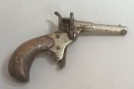 WITHDRAWN - A 19th Century hammer action muff pistol (.