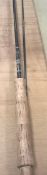 A Hardy "Ultralite" 9 ft 6" #7 two piece trout fly rod with makers bag and protective tube