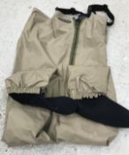 A pair of Vision chest waders and wading boots, size 8, two pairs of thigh waders,