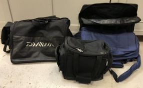 A collection Daiwa fishing luggage comprising a net bag,