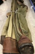 A collection of three vintage canvas "Efgeeco" rod holdalls