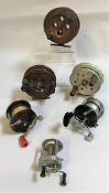 A collection of eight assorted fishing reels to include two wooden Scarborough reels, a Penn No.