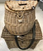 A demi-lune fisherman's basket and a further wicker creel