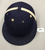 A Herbert Johnson vintage polo helmet in blue