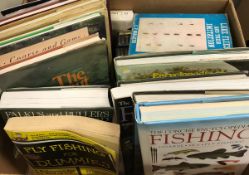 A box of fishing related volumes to include "Fly Fishing for Dummies",