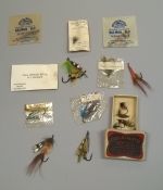 A Megan Boyd business card contained in an envelope with four hand tied Atlantic salmon flies,