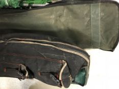 A collection of three fisherman's rod holdalls by Daiwa, Efgeeco and J.R.