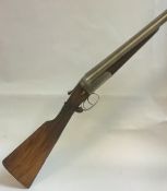 A William Powell & Son 12 bore shotgun, double barrel side by side, box lock ejector,