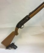 A Crosman 2100 Classic .177 pellet/BB repeater rifle (No. 488238299) together with an Italian MA.