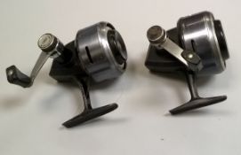 An ABU 507 closed faced fishing reel and an ABU 506 fishing reel with spare spool and pouches