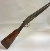 A William Powell & Son 12 bore shotgun, double barrel side by side, side lock "no.