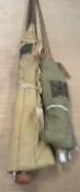 A Hardy "Alnwick Greenheart" three piece greenheart trout fly rod with spare top together with a