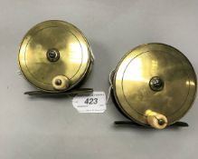 Two brass salmon fly reels by C.