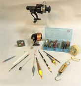 A collection of assorted fishing tackle to include an Abu "503", a Browning 7012 fixed spool reel,