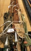 A collection of nine split cane fly fishing rods and one green heart fly fishing rod,