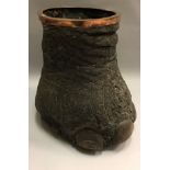 A circa 1900 Elephant foot stick stand or bin with copper rim