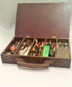 A Wrexine tackle box containing a quantity of silk bodied Devon minnows,