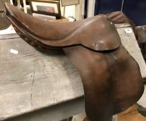 An Old English pony saddle, seat approx 16.