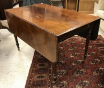 A 19th century mahogany two drawer Pembroke table