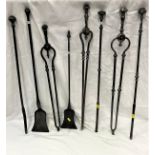 A collection of eight various 18th/19th Century fire irons in similar styles