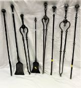 A collection of eight various 18th/19th Century fire irons in similar styles