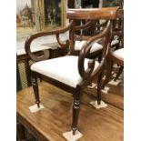 A set of eight (6 + 2) Victorian mahogany bar back dining chairs with drop in seats on turned and