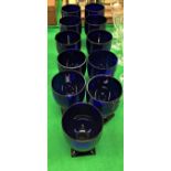 A suite of eleven William Yeoward blue glass wines on square bases