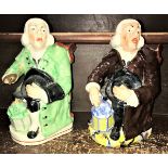 Two 19th Century Staffordshire character jugs as "The Night Watchman", one in green jacket,