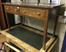 An early 20th Century mahogany two drawer side table