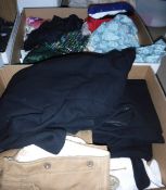 A box containing various gentleman's clothing to include black tails, corduroy breeks, etc,