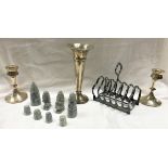 A box of sundry items to include a pair of silver candlesticks, a silver vase, soapstone chess set,