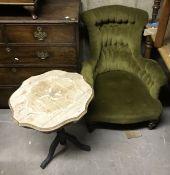 A Victorian button back salon elbow chair on turned front legs,