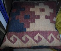 A collection of seven Kelim style scatter cushions,