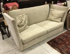 An early to mid 20th Century upholstered Knowle style sofa