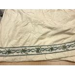 Two and a half pairs of cream silk with chenille braid border interlined curtains with fixed pencil