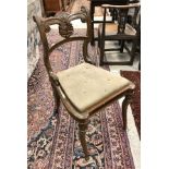 A set of six mahogany scroll back dining chairs with drop-in seats