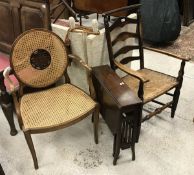 A 19th Century rush seat ladder back armchair,