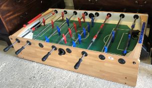 A modern "The Garlando" soccer-football table game on metal supports