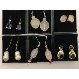 Six pairs of various silver mounted stone set earrings to include rose quartz,