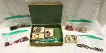 A box containing a velvet covered jewellery box containing assorted costume jewellery,