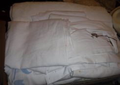 A box of assorted bed linen,