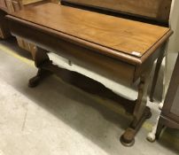 An early 20th Century two drawer side table,