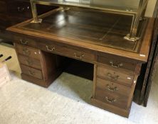 A 20th Century mahogany partner's desk,