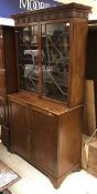 A 19th Century mahogany bookcase cabinet,