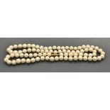 A South Seas white pearl necklace, approx 34" long,