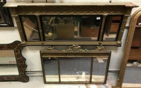 A 19th Century giltwood and gesso framed overmantel mirror with three-part plate interspersed by