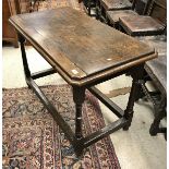 A 19th Century small oak refectory table with replacement top