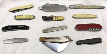 A collection of twelve pocket knives